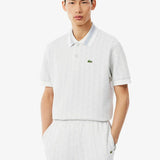 Polo dal taglio classico in jacquard con monogramma 