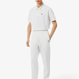 Polo dal taglio classico in jacquard con monogramma 