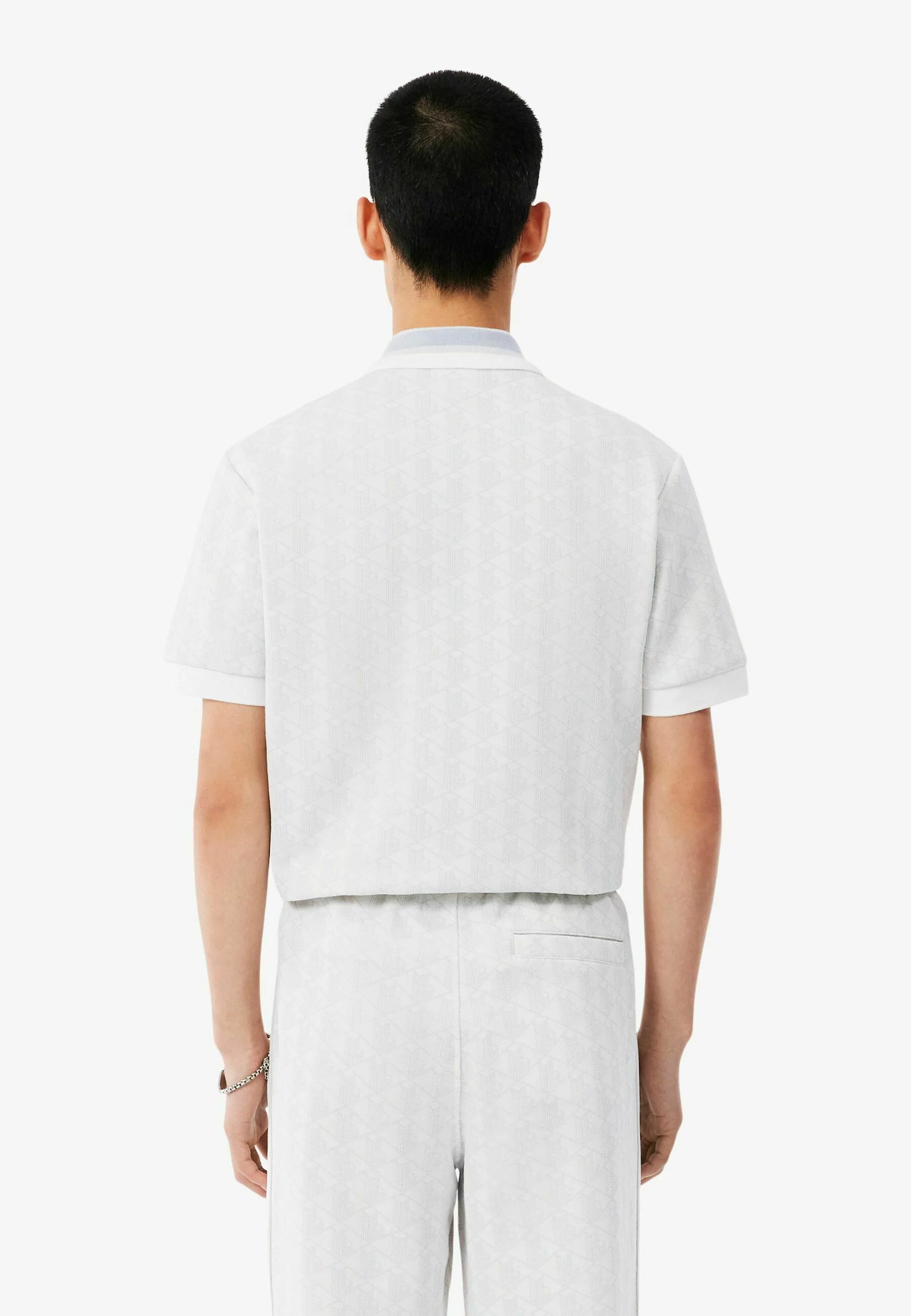 Polo dal taglio classico in jacquard con monogramma 