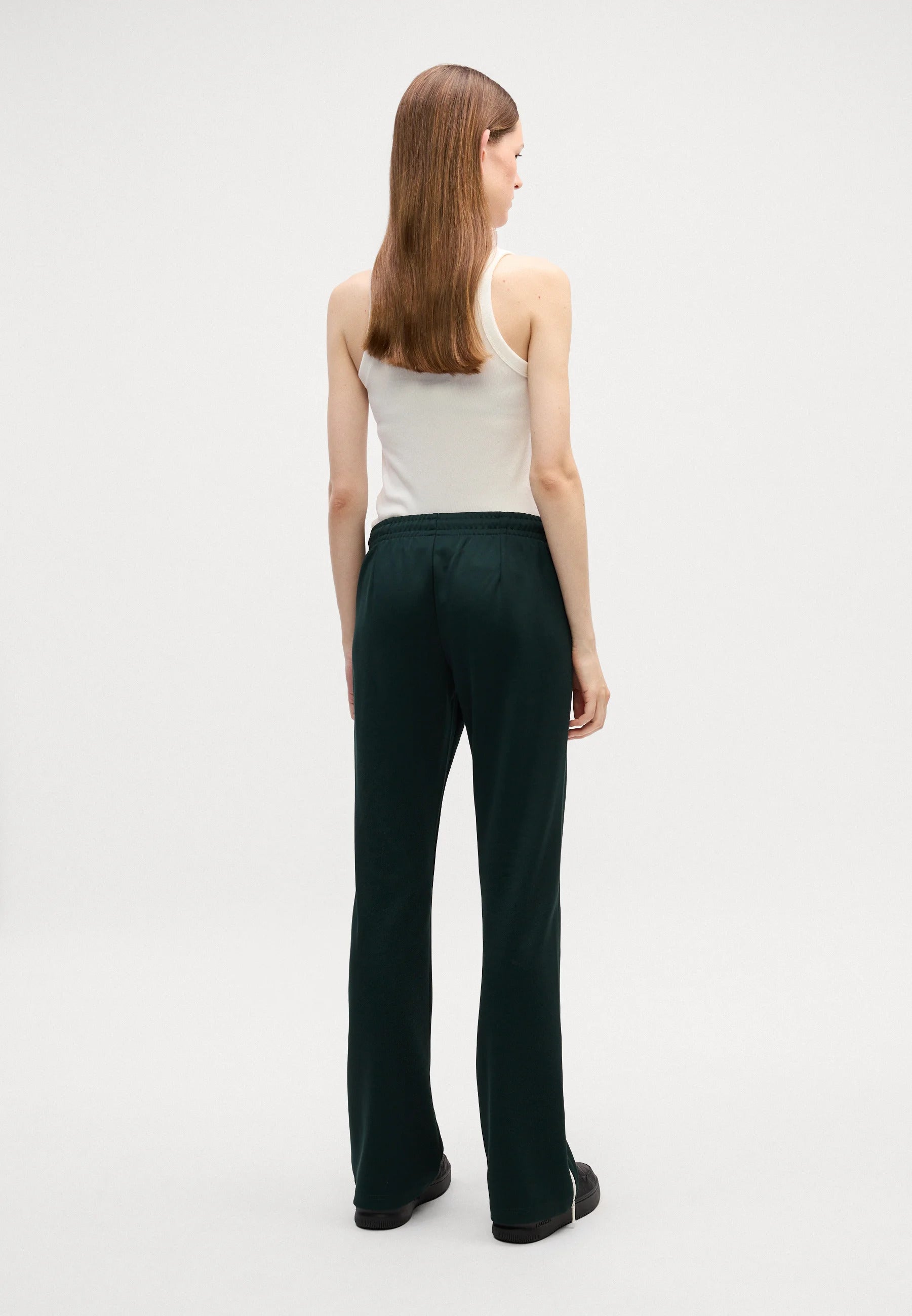 Pantaloni felpati taglio svasato con pieghe 